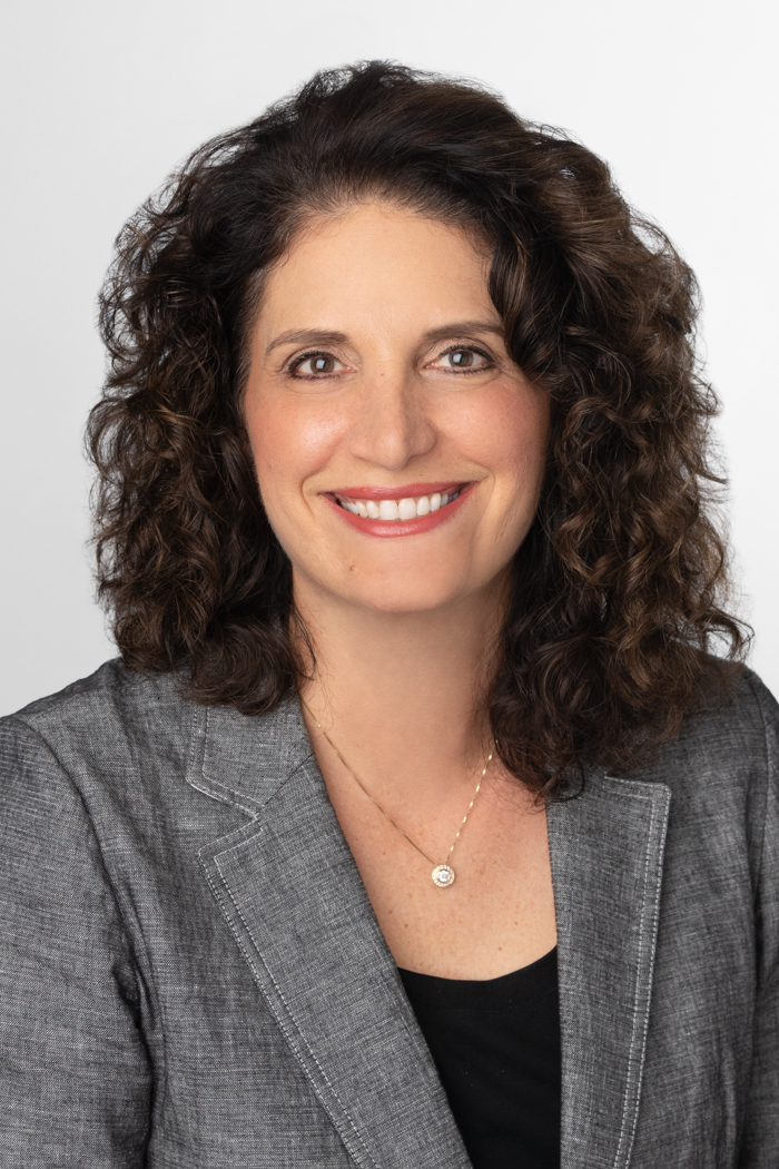 A photograph of Angela Fontana, SVP, CLO, and Secretary at Everlake, and President of Association of Life Insurance Council.